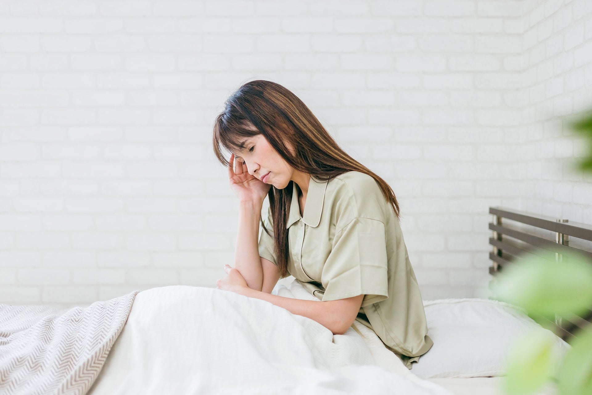 痛みに悩む女性